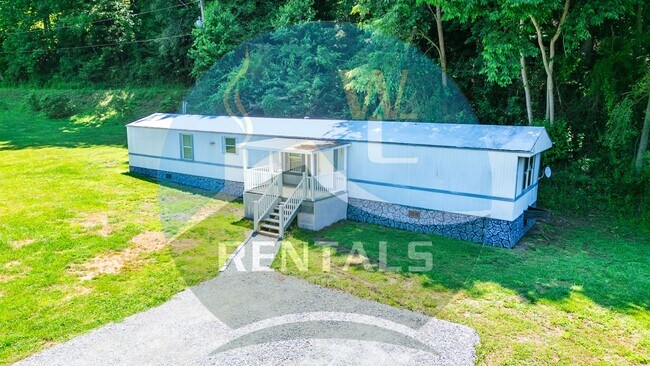 Photo - Charming 3-bedroom, 2-bath single wide trailer in Whittier, NC available now for year-long lease.