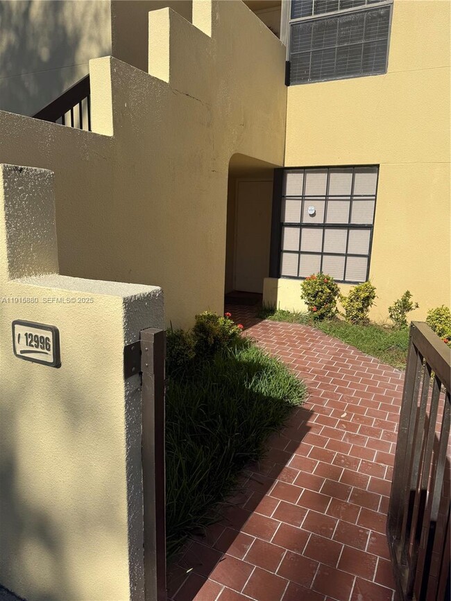 Building Photo - 12996 SW 88th Ln Unit B101