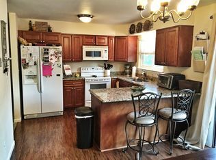 Photo - "Spacious 4-Bedroom Aurora Gem with Cozy Fireplace and 3 Full Baths!"