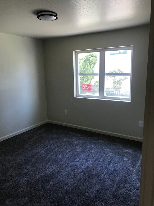 bedrooms have carpeting and double paned windows. Bedrooms have built in closets. - 314 Rigg St
