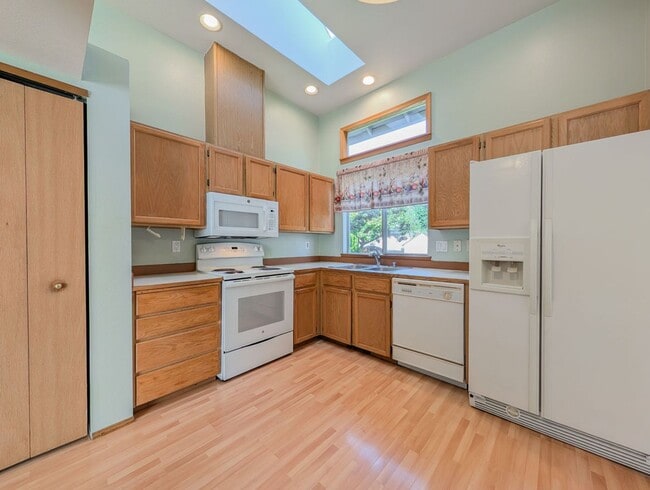 Photo - Tri-Level Home w/ Bonus Room, 2-Car Garage & Fenced Yard!