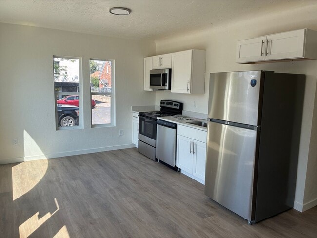 Building Photo - Garland Triplex Unit 1