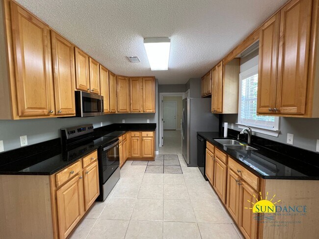 Photo - Spacious 3-Bedroom Retreat with New Kitchen Appliances!
