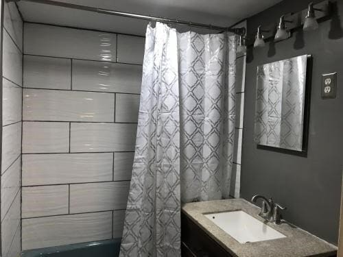 Renovated Bath - 950 25th St NW Apartment Unit 802N