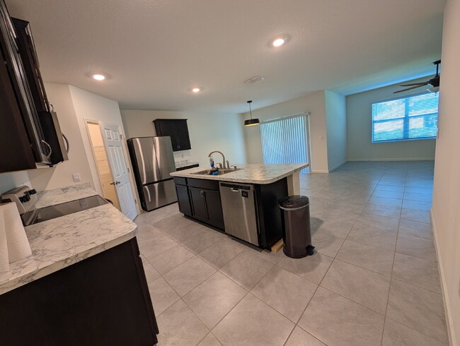 Photo - Modern 4-Bedroom Home with Large Backyard in Quiet SW Palm Bay – Available Mid-June