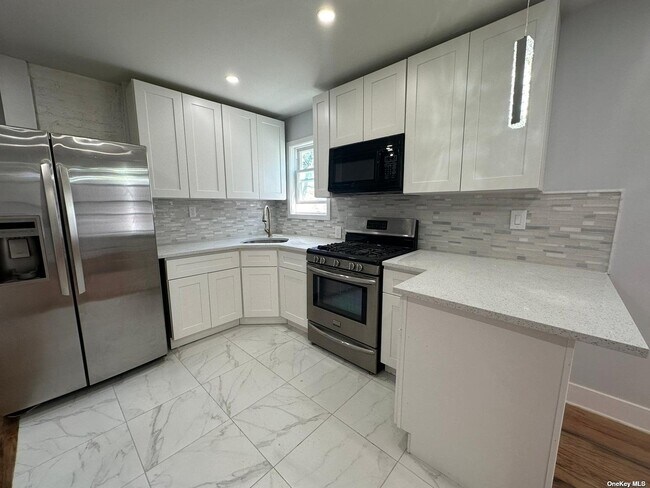 Photo - 105-63 134th St