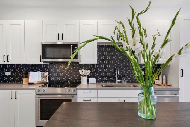 Photo - Top-Floor Denver Condo Offering Privacy, Views & Upgraded Appliances Unit 404