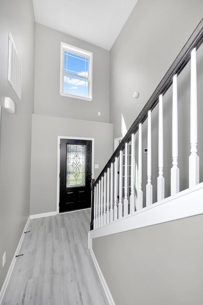 Photo - Fresh Paint & New Carpet! 4BR with Fenced Yard