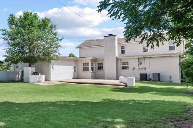 Photo - A modern revival of classic architecture, this Nichols Hills residence has been meticulously rebu...