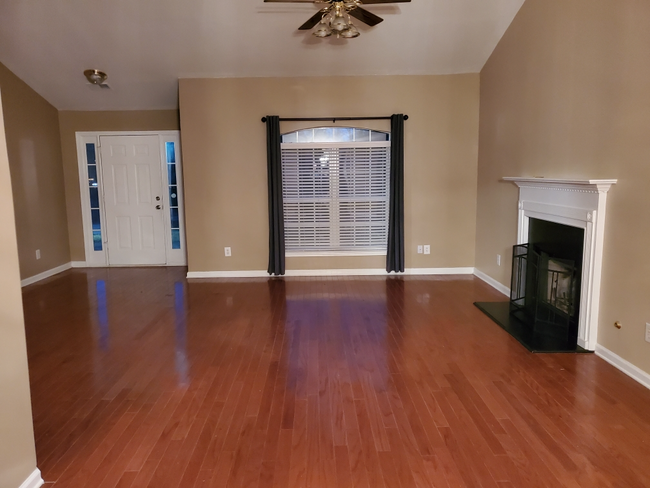 living room with fire place - 9425 Rivertown Rd House