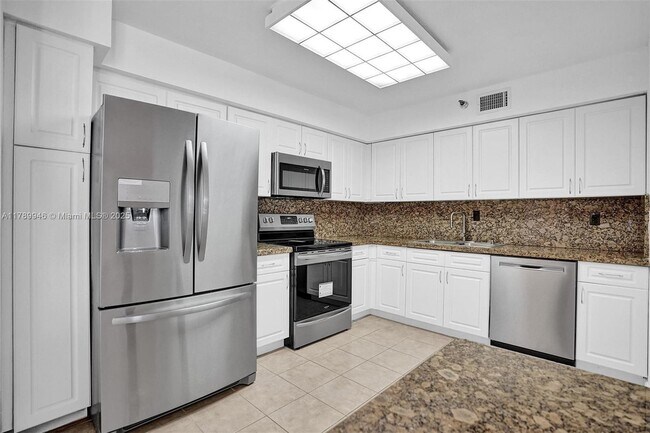 Building Photo - 3530 Mystic Pointe Dr Unit 1812 Rental