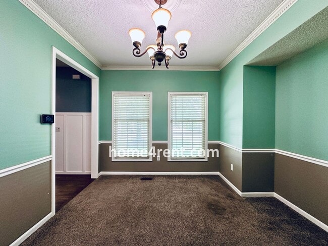 Photo - Blue Valley Schools w/ Wood Floors, Finished Basement and a Peaceful, Private Fenced Yard!