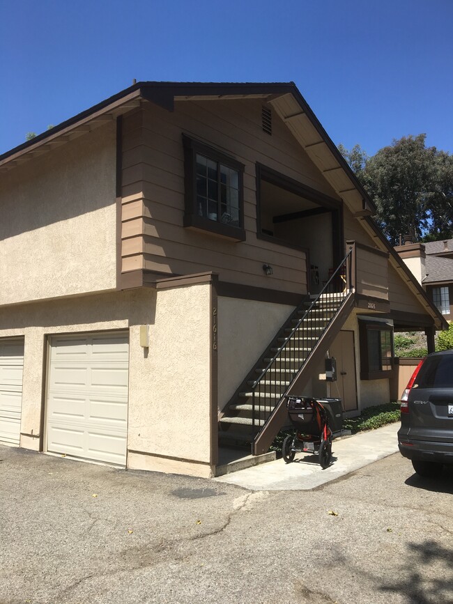 Living area is on the second level above the garage. One assigned parking spot included.... - 21616 Laurelrim Dr Condo Unit B