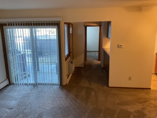 Living Room & Hallway - Apartment Homes of Wildwood Preserve in beautiful Oak Creek, WI