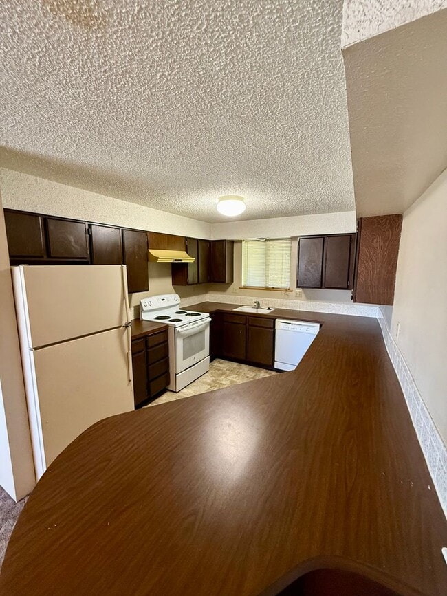 Photo - Hard to find 2 bdrm, 2 full bath unit with water, sewer, and garbage. Onsite laundry and A/C!