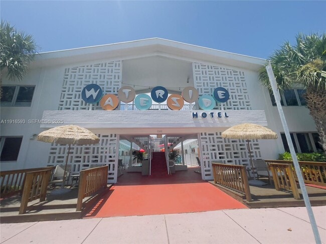 Building Photo - 7310 Harding Ave Unit 318