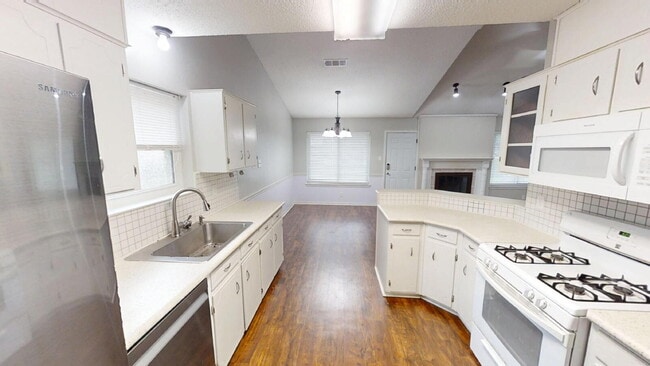 Photo - Step into comfort and convenience with this beautifully designed two-story home!
