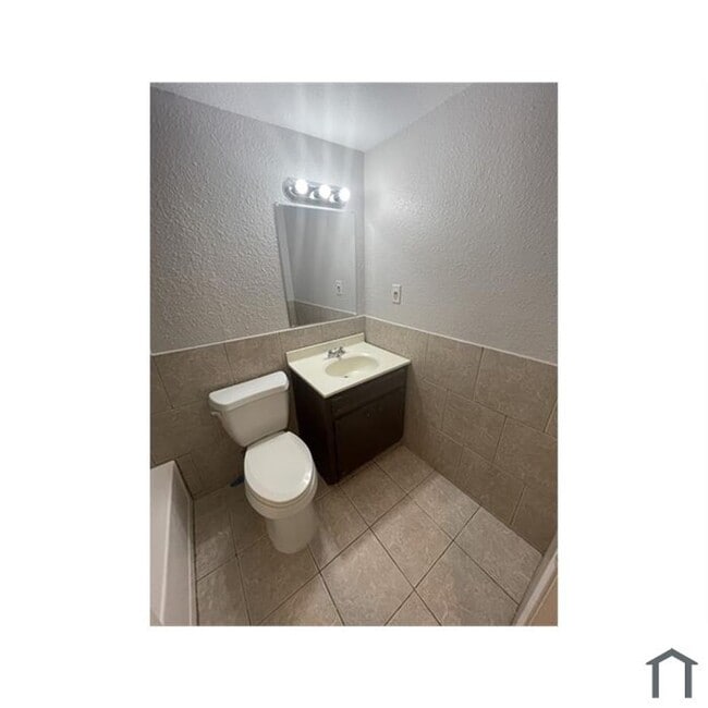 Photo - Discover your dream home in this beautifully renovated four-bedroom, two-bathroom house.