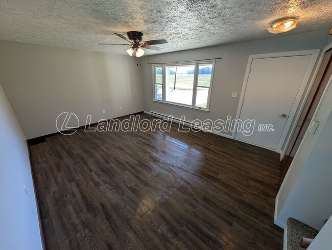 Photo - Spacious 4-Bedroom Home with Scenic Views ...