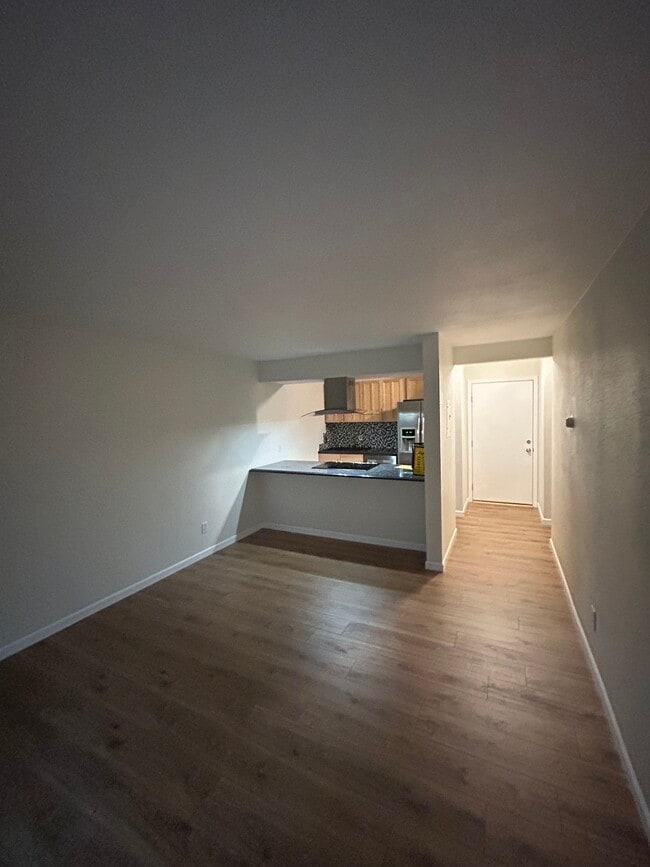 Living room - back to kitchen - great space for bar stools! A - 2707 Valmont Rd Unit Two Mile Creek Conds