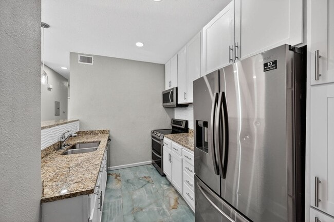 Photo - 10784 W 63rd Pl