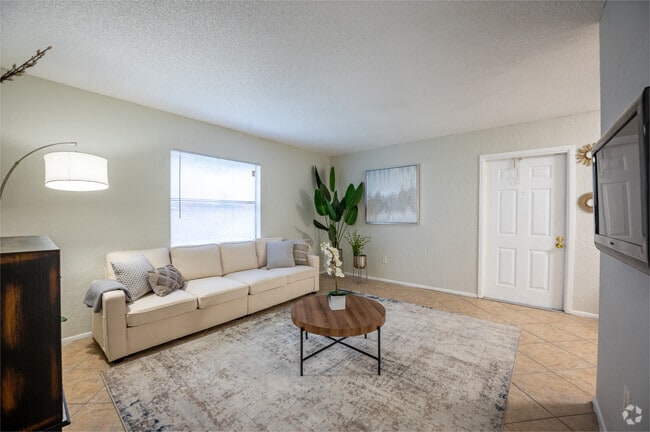 2BR, 2BA - 900SF - Living Room - The Apartments at Oak Creek