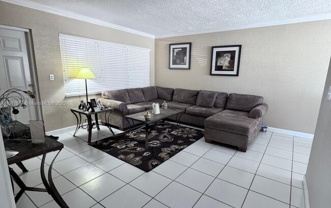 Building Photo - 2451 NE 49th St Unit 213