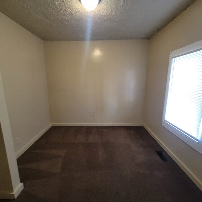 Photo - 3/2 with fenced-in backyard & storage shed