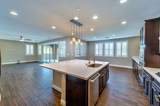 Photo - A unique Gem in Inspirada! 5 beds, 3 car, bedroom downstairs and Pool/spa!