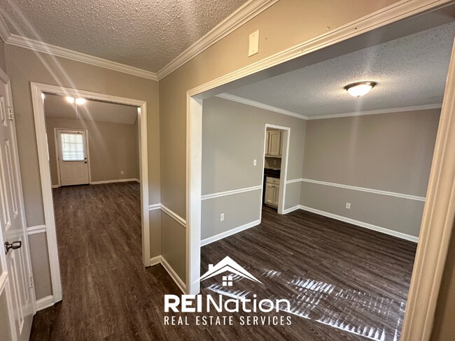 CORDOVA COVE CHARMER! 3BR/2BA | High Ceilings & Brick Fireplace | 2-Car Garage!