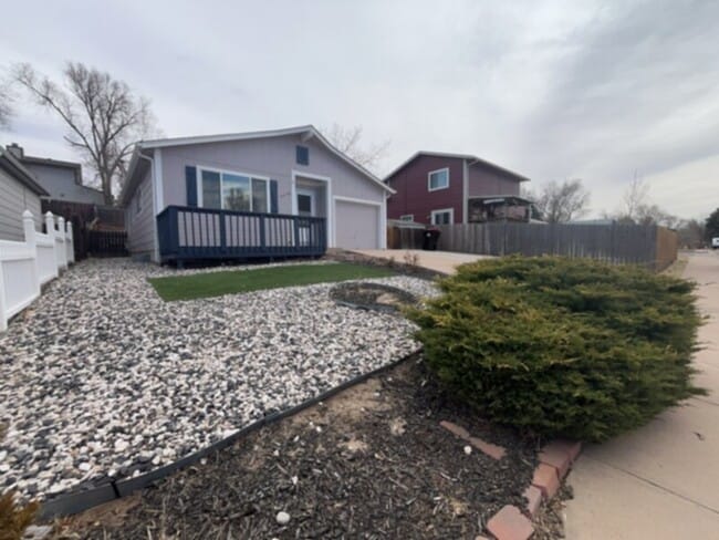 Building Photo - Beautiful ranch style home that has a finished basement and stunning views from the front deck!