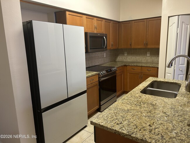 Building Photo - 10435 Mid Town Pkwy Unit 206