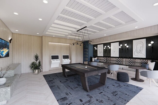 From arcade games to billiards and relaxed lounge seating, our elevated rec space is designed for connection and easy enjoyment - The Residence Peninsula Apartments