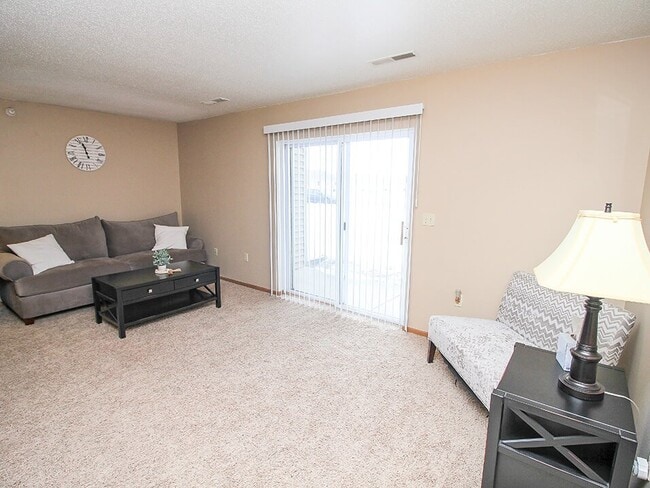 Living room with patio access