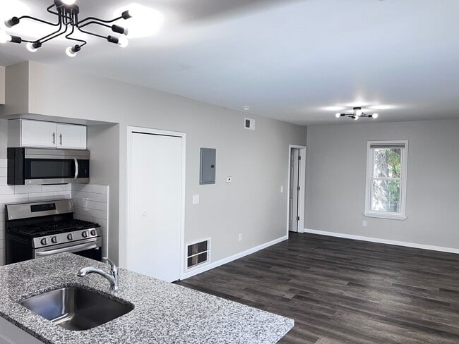 Building Photo - The Duplex on Plumer: Where Modern Meets M... Rental