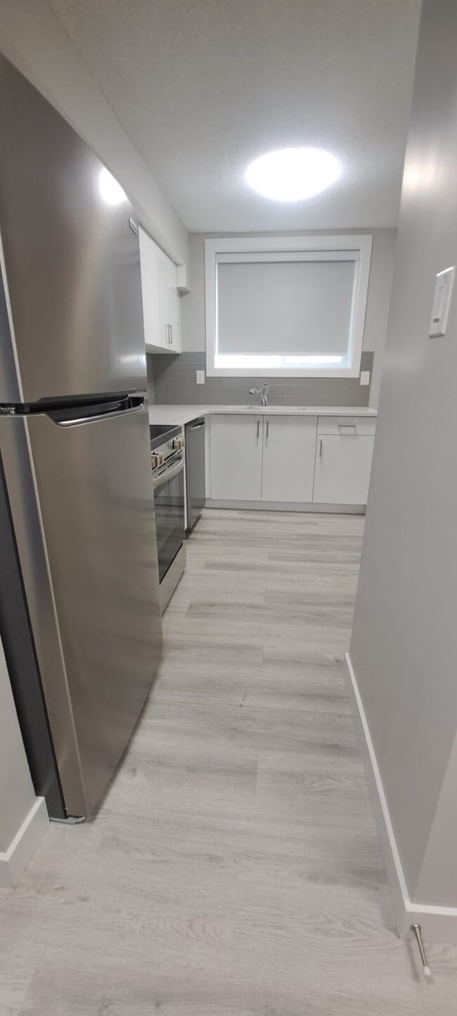 Photo - 9938-88 88 Ave NW Unité 2