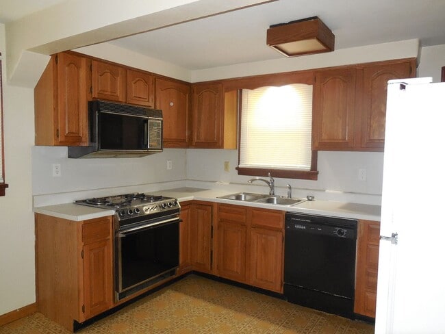 Photo - Two Bedroom House with Drive Under Garage!