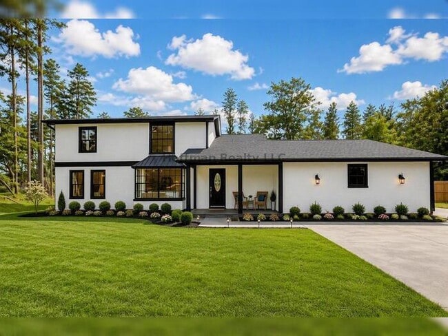 Building Photo - Stunning Lakefront Home with Private Access to Lake Thomas