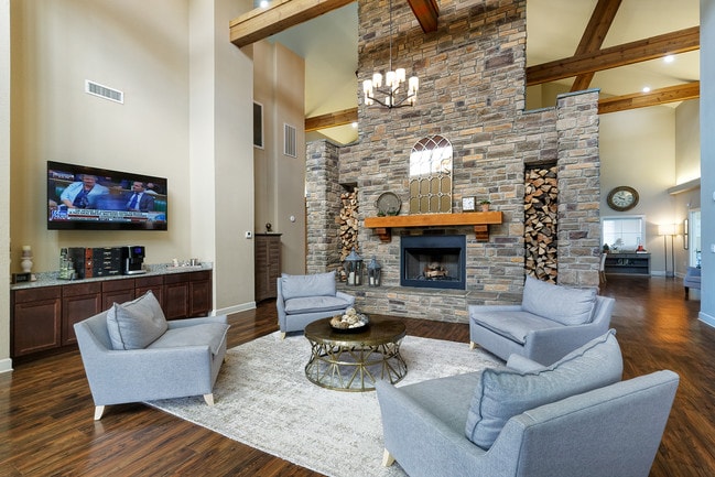 Clubhouse resident lounge with fireplace and coffee bar