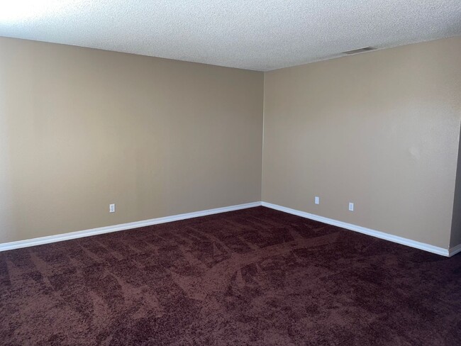 Photo - Move-In Ready 3-Bedroom Home with Backyard Living