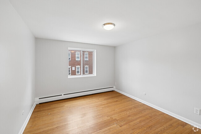 2BR, 1BA - 1,100SF -Primary Bedroom