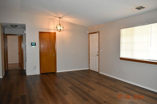 Photo - Charming 3-Bedroom Home with Spacious Backyard & 2-Car Garage