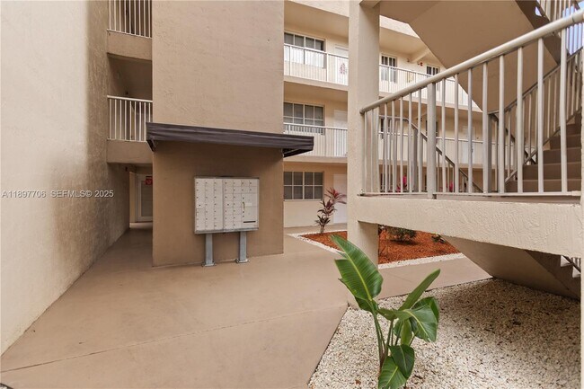 Building Photo - 6065 NW 186th St Unit 306