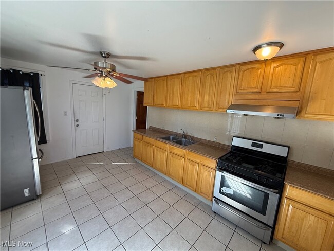 Photo - 1576 E 36th St Unit 2 Front