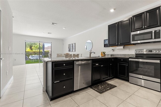 Photo - 10972 SW 235th Ln Townhome