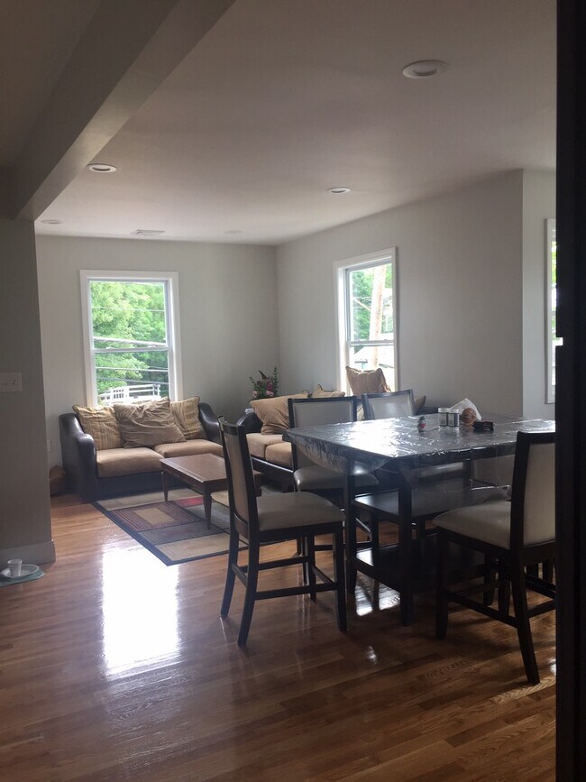 Large open living and dining area with natural light - 76 Eleanor St Unit 2