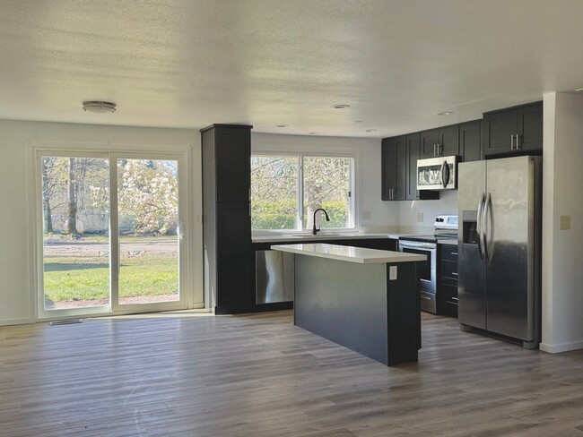 Photo - Charming 4BR Home with Huge Yard - W/D and Garage