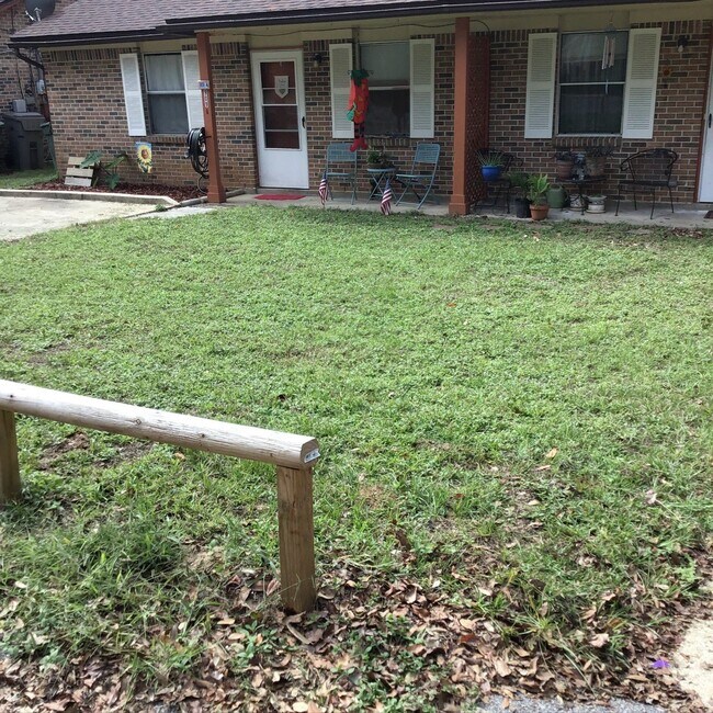 Photo - Brick Duplex Near NAS Pensacola & Corry Station with Tile Flooring Throughout and Fully Fenced Ba... Unit B