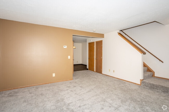 3 habitaciones, 2.5 baños - 1233 pies cuadrados - The Onyx - Sala de estar - Ashton Meadows