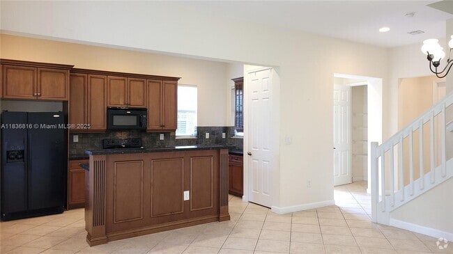Building Photo - 6033 NW 118th Dr Rental